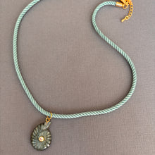 Load image into Gallery viewer, Labradorite and Cubic Zirconia carved Ammonite Necklace, Light Teal Cord