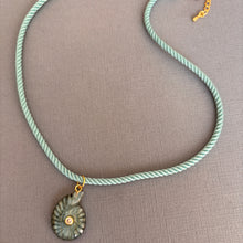 Load image into Gallery viewer, Labradorite and Cubic Zirconia carved Ammonite Necklace, Light Teal Cord