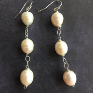 big pearl earrings